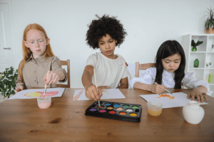 12 Ways to Stay Healthy for Online Students, image of young kids at a table painting