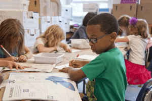 Private School Admissions 2023: Timeline and Tips, image of young kids working on their private school admissions application