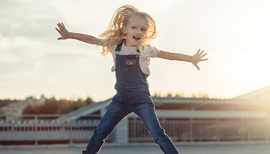 BoostYOURself Enrollment, image of girl jumping.