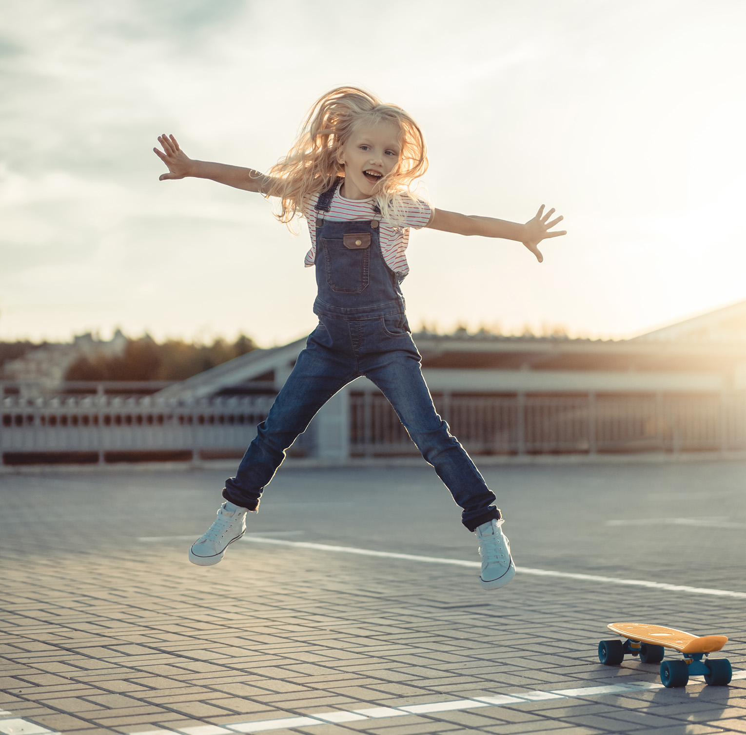 summer tutoring bootcamp san diego, image of kid jumping.